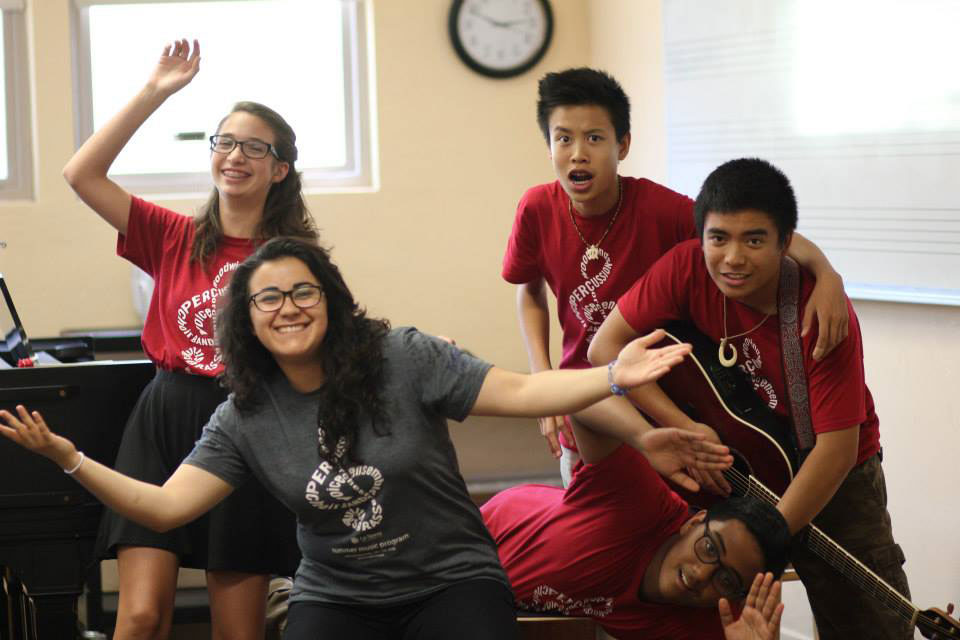 Susana Leiva having fun with her students in a music camp.